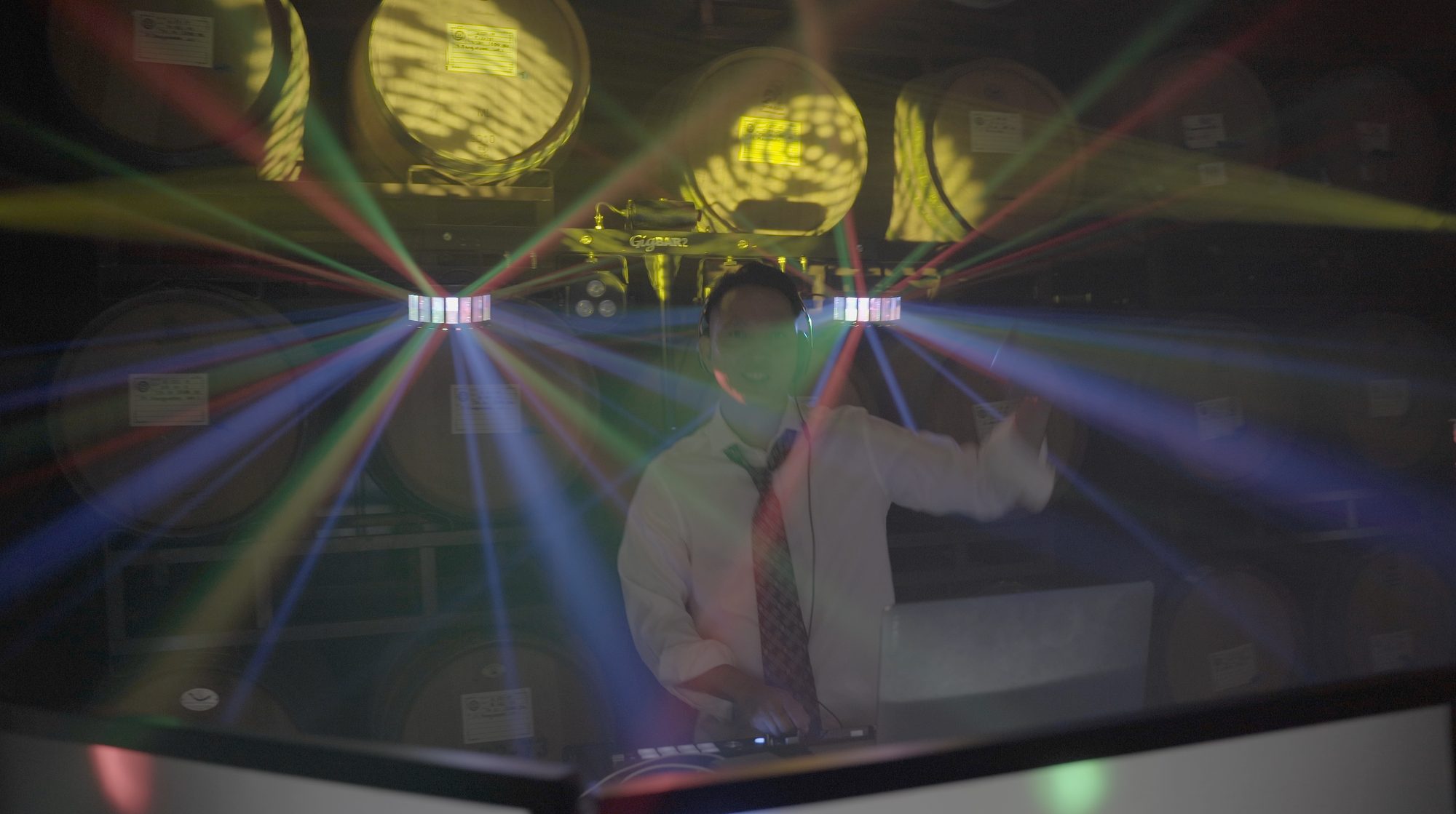 DJ Logos mixing under the lights