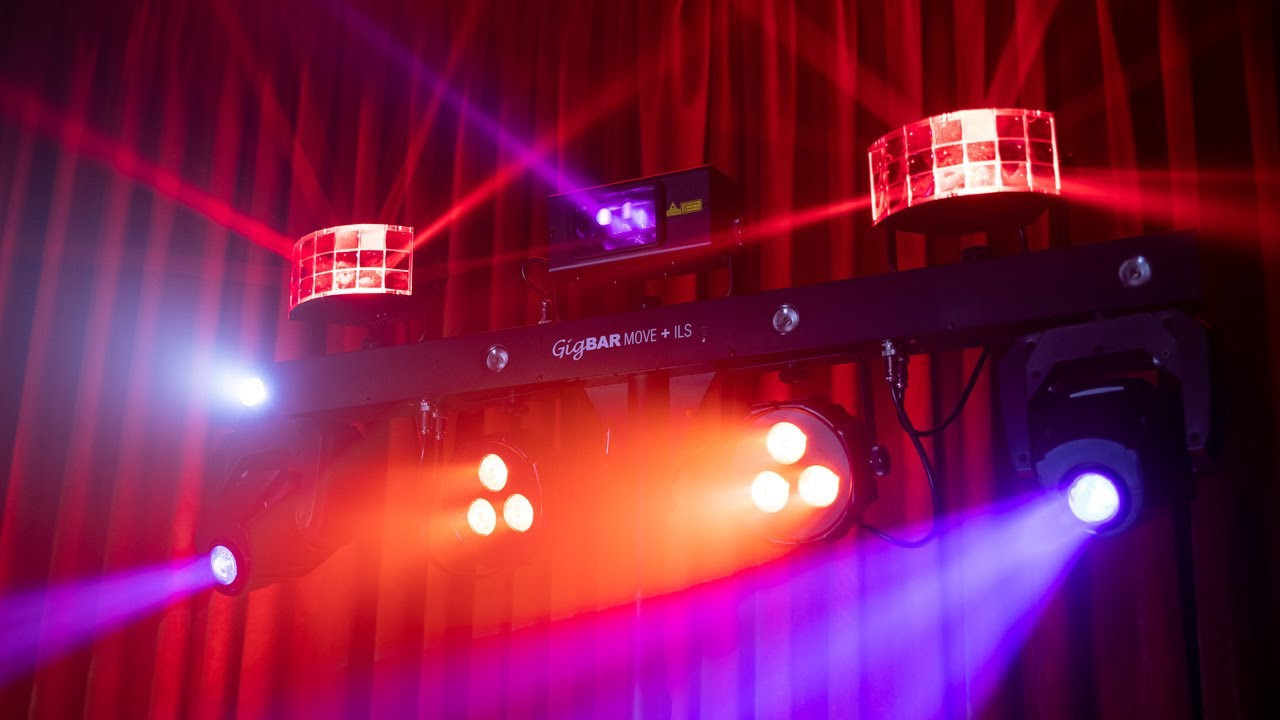 Dancefloor lighting rig with dramatic uplighting and white dancefloor